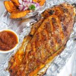 Grilled Croaker Fish (Medium) with a side of Yam of Plantain