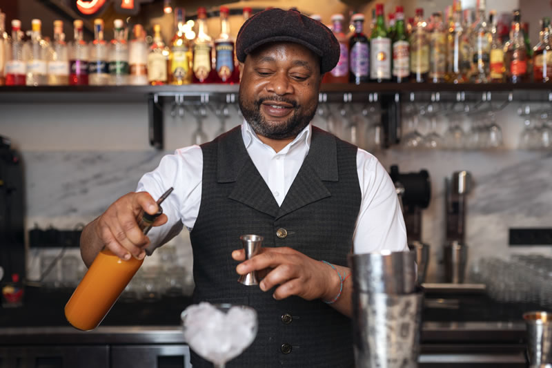 bartender-preparing-drink-bar